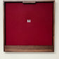 Walnut hardwood dartboard cabinet 32" x 32" x 3.5" with dart storage ruby red felt wrapped around the foam backer.